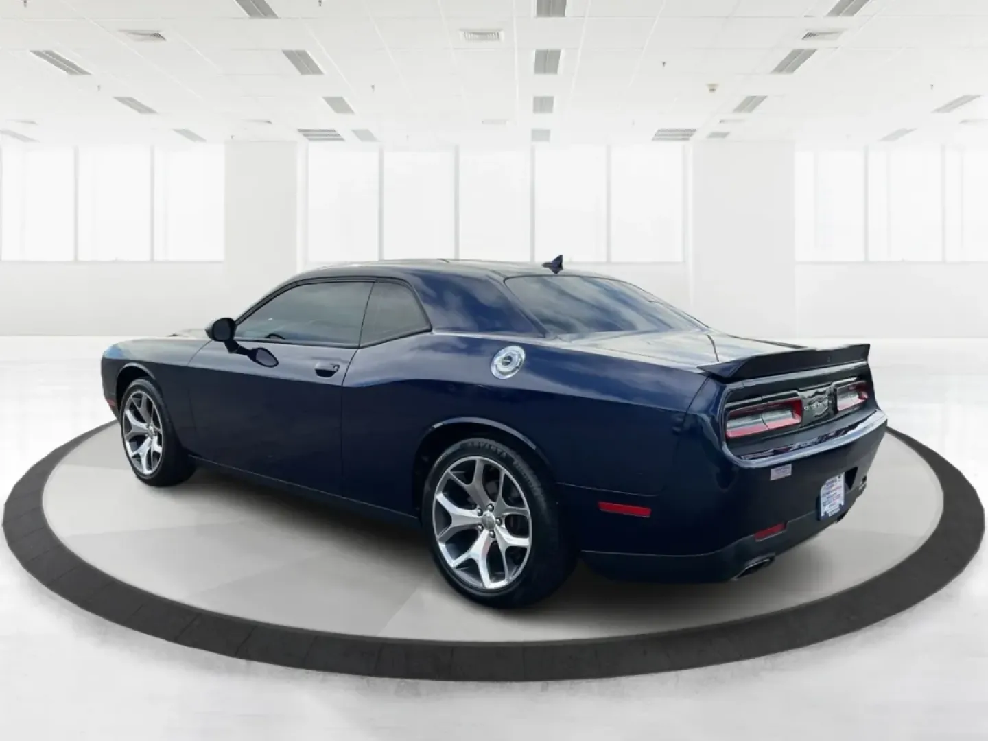 2015 Dodge Challenger SXT Plus (2C3CDZBG5FH) with an 3.6L V-6 DOHC engine, located at 8750 N County Rd 25A, Piqua, OH, 45356, (937) 908-9800, 40.164391, -84.232513 - Unleash your inner muscle car enthusiast with this striking 2015 Dodge Challenger SXT Plus, available now at Advantage Car and Credit in New Carlisle, OH! With its powerful yet efficient 3.6L V-6 DOHC engine, this coupe is perfect for weekend adventures, cruising down scenic routes, or standing out - Photo#4