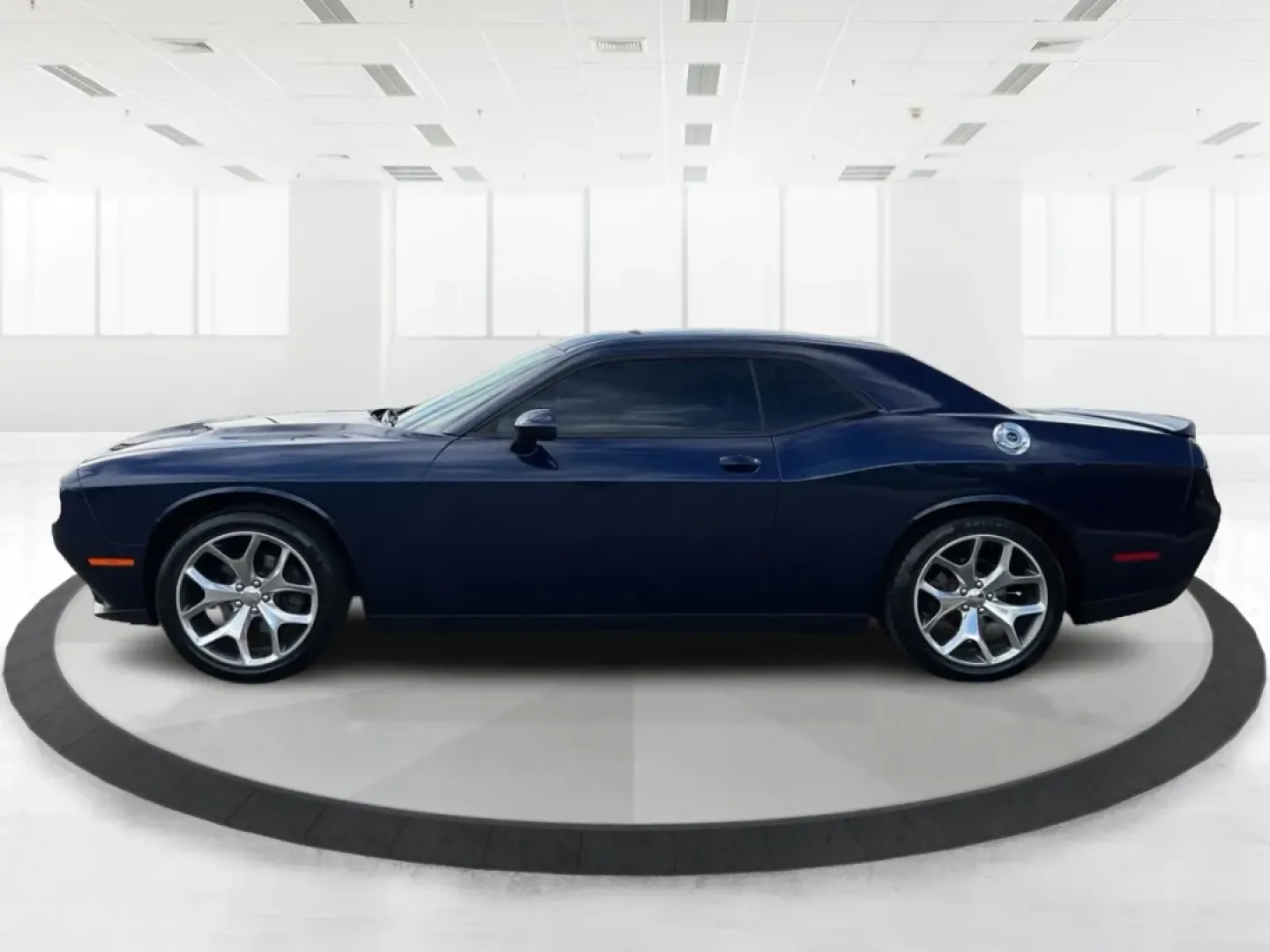 2015 Dodge Challenger SXT Plus (2C3CDZBG5FH) with an 3.6L V-6 DOHC engine, located at 8750 N County Rd 25A, Piqua, OH, 45356, (937) 908-9800, 40.164391, -84.232513 - Unleash your inner muscle car enthusiast with this striking 2015 Dodge Challenger SXT Plus, available now at Advantage Car and Credit in New Carlisle, OH! With its powerful yet efficient 3.6L V-6 DOHC engine, this coupe is perfect for weekend adventures, cruising down scenic routes, or standing out - Photo#5