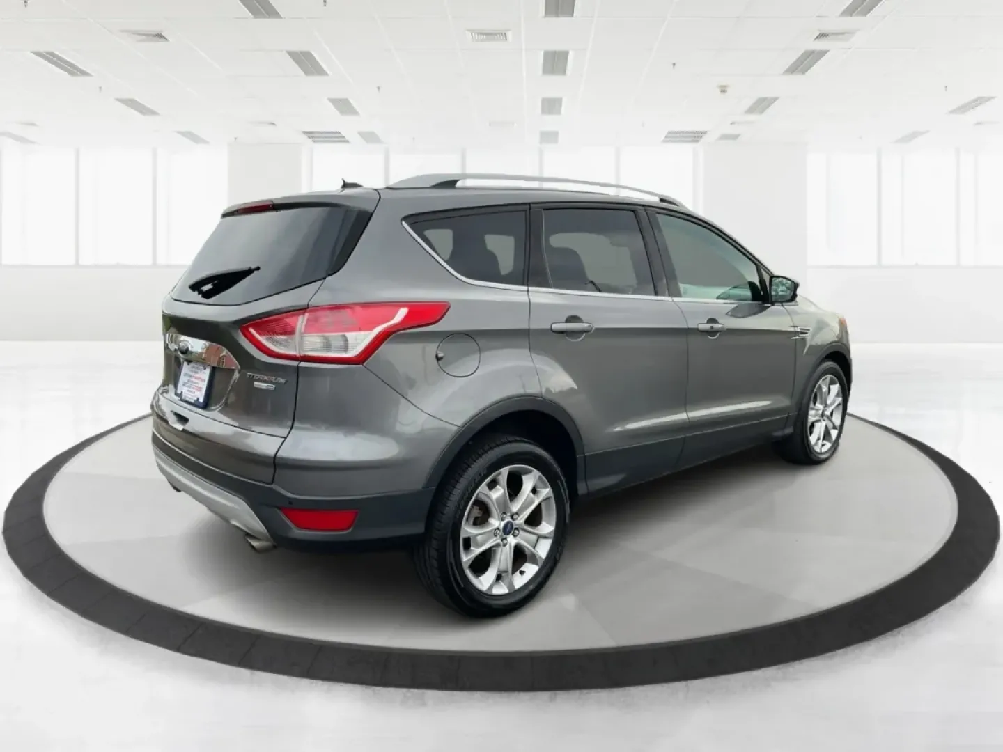 2014 Ford Escape Titanium (1FMCU9J97EU) with an Other engine, located at 401 Woodman Dr, Riverside, OH, 45431, (937) 908-9800, 39.760899, -84.123421 - **Upgrade Your Adventures with the 2014 Ford Escape Titanium at Advantage Car and Credit - Riverside!**<br /> <br /> Are you ready to elevate your weekend getaways or daily commutes with a versatile and stylish SUV? Look no further than the 2014 Ford Escape Titanium, available now at Advantage Car a - Photo#2