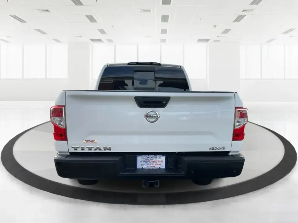 2021 Nissan TITAN Crew Cab S 4x4 (1N6AA1EC4MN) with an Endurance 5.6L V-8 gasoline direct injection engine, 9A transmission, located at 1099 N County Rd 25A , Troy, OH, 45373, (937) 908-9800, 40.057079, -84.212883 - Discover ultimate versatility and rugged capability with this 2021 Nissan TITAN Crew Cab S 4x4, now available at Advantage Car and Credit in Piqua, OH. Whether you're navigating the bustling streets of Piqua or heading out for weekend adventures, this truck is designed to adapt to your lifestyle. Pe - Photo#3