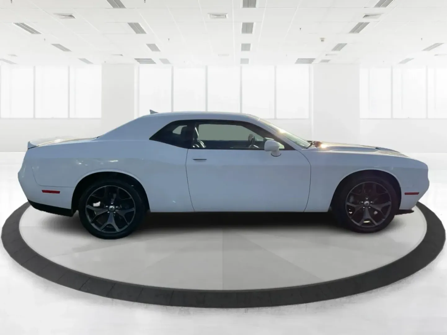 2018 Dodge Challenger SXT Plus (2C3CDZAG0JH) with an Pentastar 3.6L V-6 DOHC engine, located at 8750 N County Rd 25A, Piqua, OH, 45356, (937) 908-9800, 40.164391, -84.232513 - Unleash your inner road warrior with the 2018 Dodge Challenger SXT Plus, the perfect blend of power, style, and everyday functionality. Whether you're tackling the daily commute or planning weekend adventures with friends, this stunning coupe ensures you do it in comfort and confidence. Located at A - Photo#1