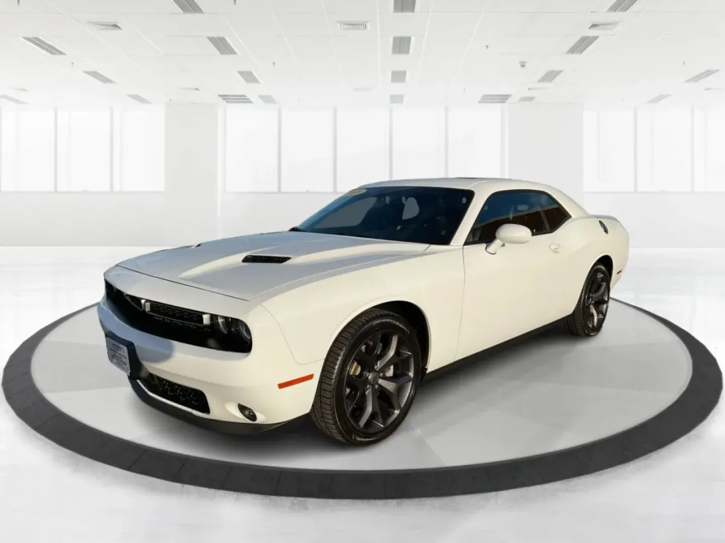 2018 Dodge Challenger SXT Plus (2C3CDZAG0JH) with an Pentastar 3.6L V-6 DOHC engine, located at 8750 N County Rd 25A, Piqua, OH, 45356, (937) 908-9800, 40.164391, -84.232513 - Unleash your inner road warrior with the 2018 Dodge Challenger SXT Plus, the perfect blend of power, style, and everyday functionality. Whether you're tackling the daily commute or planning weekend adventures with friends, this stunning coupe ensures you do it in comfort and confidence. Located at A - Photo#8