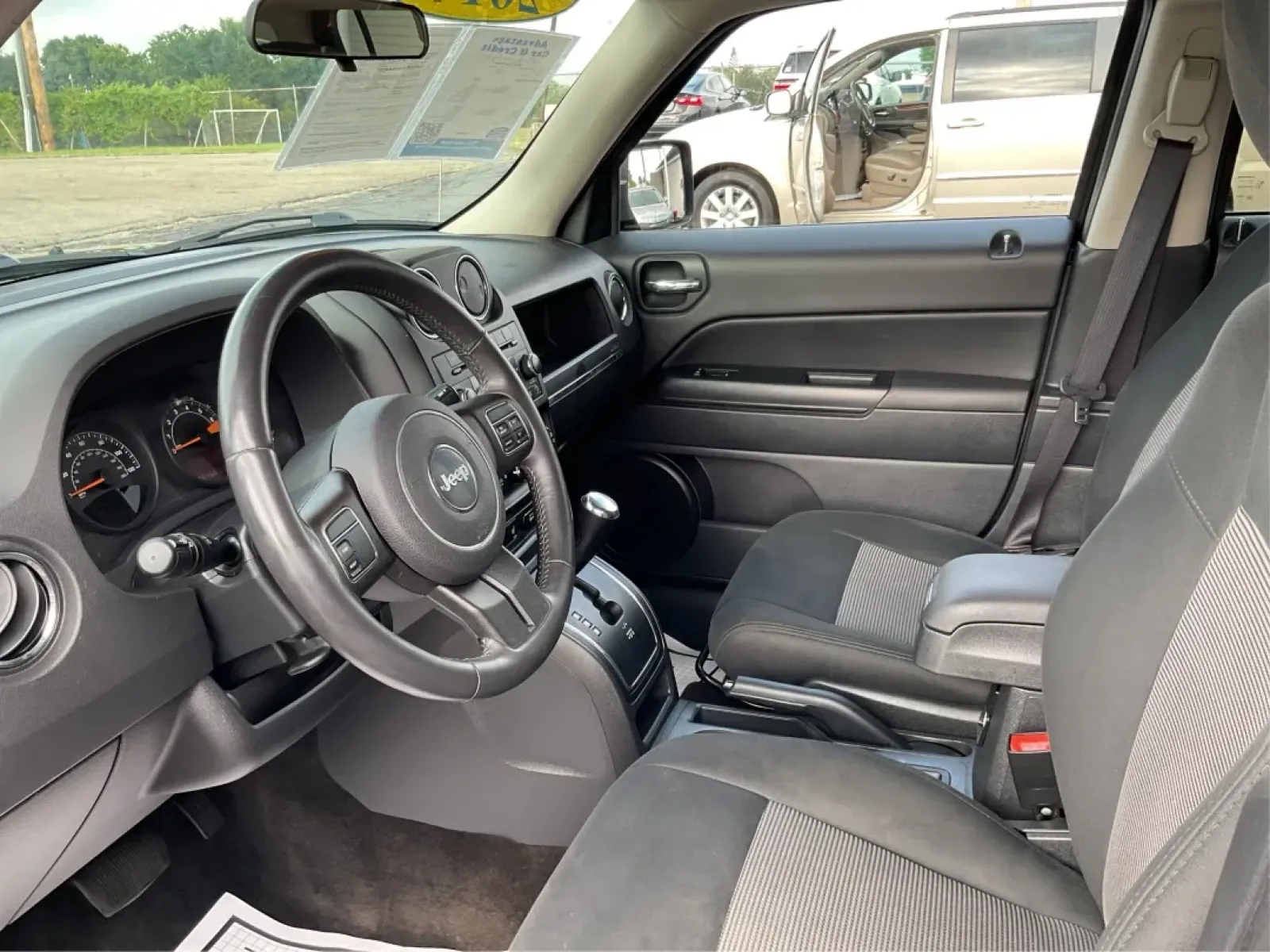 2014 Jeep Patriot Latitude (1C4NJPFA4ED) with an Other engine, located at 4508 South Dixie Dr, Moraine, OH, 45439, (937) 908-9800, 39.689976, -84.218452 - **Adventure Awaits with This 2014 Jeep Patriot Latitude at Advantage Car and Credit - Moraine!**<br /> <br /> Are you ready to embark on new adventures, whether it's a weekend getaway, a family road trip, or daily commutes? This 2014 Jeep Patriot Latitude is your perfect companion for all these scen - Photo#9