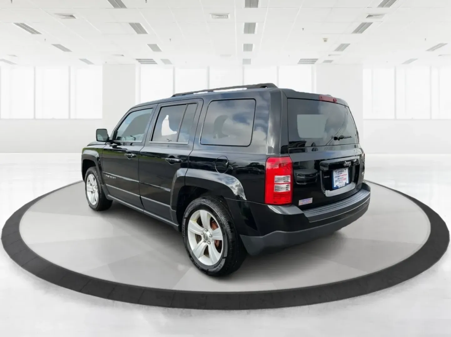 2014 Jeep Patriot Latitude (1C4NJPFA4ED) with an Other engine, located at 1099 N County Rd 25A , Troy, OH, 45373, (937) 908-9800, 40.057079, -84.212883 - **Adventure Awaits with This 2014 Jeep Patriot Latitude at Advantage Car and Credit - Moraine!**<br /> <br /> Are you ready to embark on new adventures, whether it's a weekend getaway, a family road trip, or daily commutes? This 2014 Jeep Patriot Latitude is your perfect companion for all these scen - Photo#4