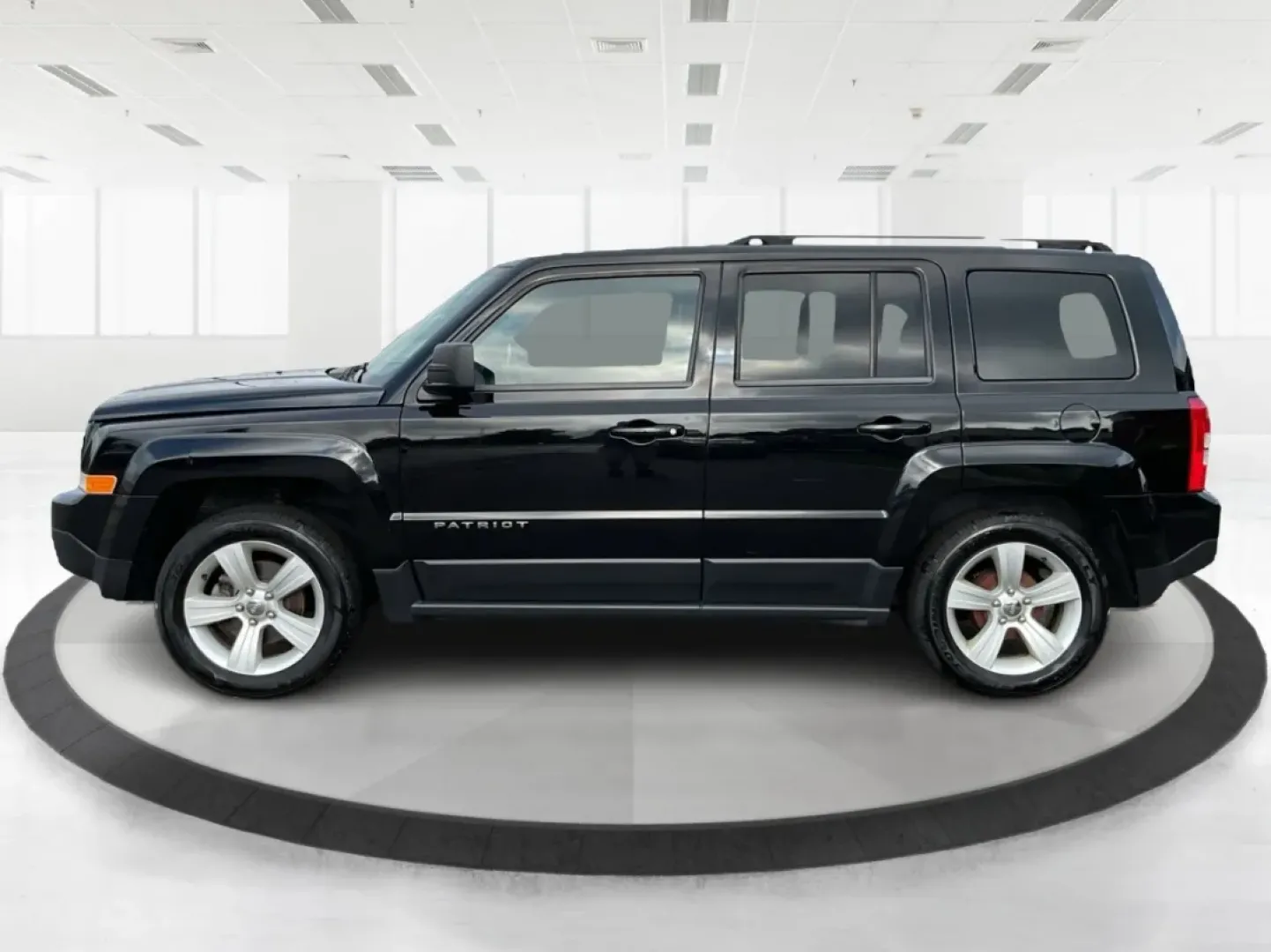 2014 Jeep Patriot Latitude (1C4NJPFA4ED) with an Other engine, located at 1099 N County Rd 25A , Troy, OH, 45373, (937) 908-9800, 40.057079, -84.212883 - **Adventure Awaits with This 2014 Jeep Patriot Latitude at Advantage Car and Credit - Moraine!**<br /> <br /> Are you ready to embark on new adventures, whether it's a weekend getaway, a family road trip, or daily commutes? This 2014 Jeep Patriot Latitude is your perfect companion for all these scen - Photo#5
