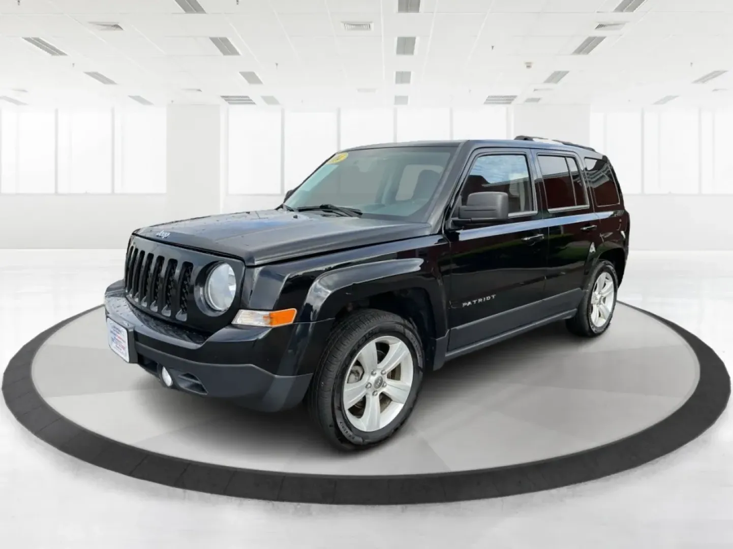 2014 Jeep Patriot Latitude (1C4NJPFA4ED) with an Other engine, located at 1099 N County Rd 25A , Troy, OH, 45373, (937) 908-9800, 40.057079, -84.212883 - **Adventure Awaits with This 2014 Jeep Patriot Latitude at Advantage Car and Credit - Moraine!**<br /> <br /> Are you ready to embark on new adventures, whether it's a weekend getaway, a family road trip, or daily commutes? This 2014 Jeep Patriot Latitude is your perfect companion for all these scen - Photo#8
