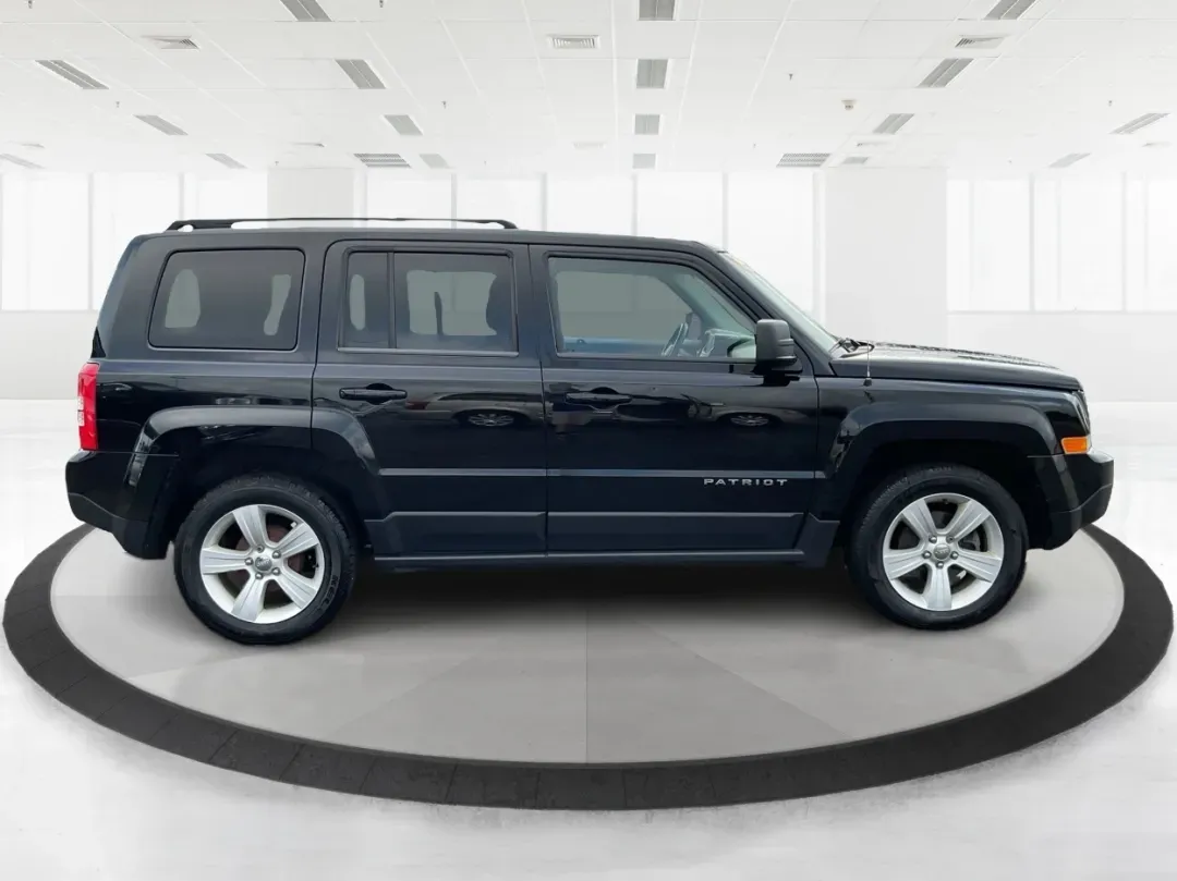 2014 Jeep Patriot Latitude (1C4NJPFA4ED) with an 2.0L L4 DOHC 16V engine, Automatic transmission, located at 880 E. National Road, Vandalia, OH, 45377, (937) 908-9800, 39.891918, -84.183594 - **Adventure Awaits with This 2014 Jeep Patriot Latitude at Advantage Car and Credit - Moraine!**<br /> <br /> Are you ready to embark on new adventures, whether it's a weekend getaway, a family road trip, or daily commutes? This 2014 Jeep Patriot Latitude is your perfect companion for all these scen - Photo#1
