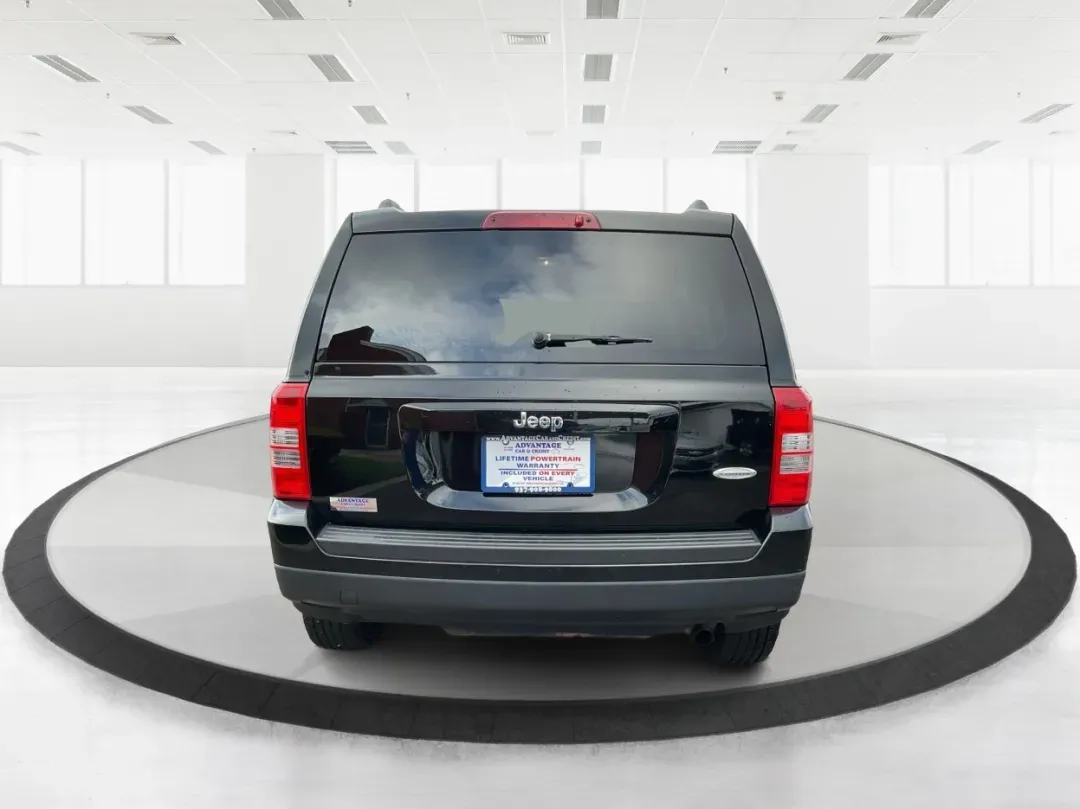 2014 Jeep Patriot Latitude (1C4NJPFA4ED) with an 2.0L L4 DOHC 16V engine, Automatic transmission, located at 880 E. National Road, Vandalia, OH, 45377, (937) 908-9800, 39.891918, -84.183594 - **Adventure Awaits with This 2014 Jeep Patriot Latitude at Advantage Car and Credit - Moraine!**<br /> <br /> Are you ready to embark on new adventures, whether it's a weekend getaway, a family road trip, or daily commutes? This 2014 Jeep Patriot Latitude is your perfect companion for all these scen - Photo#3