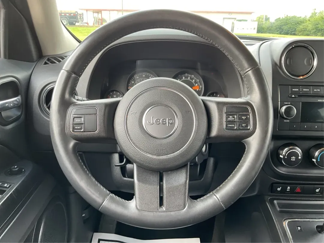 2014 Jeep Patriot Latitude (1C4NJPFA4ED) with an 2.0L L4 DOHC 16V engine, Automatic transmission, located at 880 E. National Road, Vandalia, OH, 45377, (937) 908-9800, 39.891918, -84.183594 - **Adventure Awaits with This 2014 Jeep Patriot Latitude at Advantage Car and Credit - Moraine!**<br /> <br /> Are you ready to embark on new adventures, whether it's a weekend getaway, a family road trip, or daily commutes? This 2014 Jeep Patriot Latitude is your perfect companion for all these scen - Photo#16