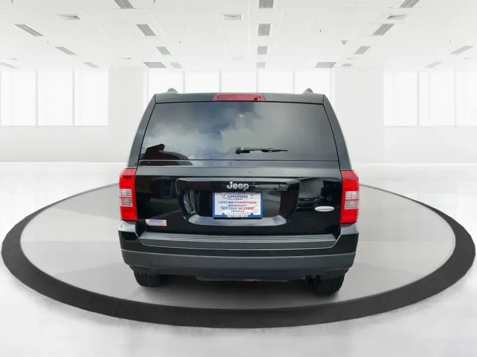 2014 Jeep Patriot Latitude (1C4NJPFA4ED) with an 2.0L L4 DOHC 16V engine, Automatic transmission, located at 880 E. National Road, Vandalia, OH, 45377, (937) 908-9800, 39.891918, -84.183594 - **Adventure Awaits with This 2014 Jeep Patriot Latitude at Advantage Car and Credit - Moraine!**<br /> <br /> Are you ready to embark on new adventures, whether it's a weekend getaway, a family road trip, or daily commutes? This 2014 Jeep Patriot Latitude is your perfect companion for all these scen - Photo#3