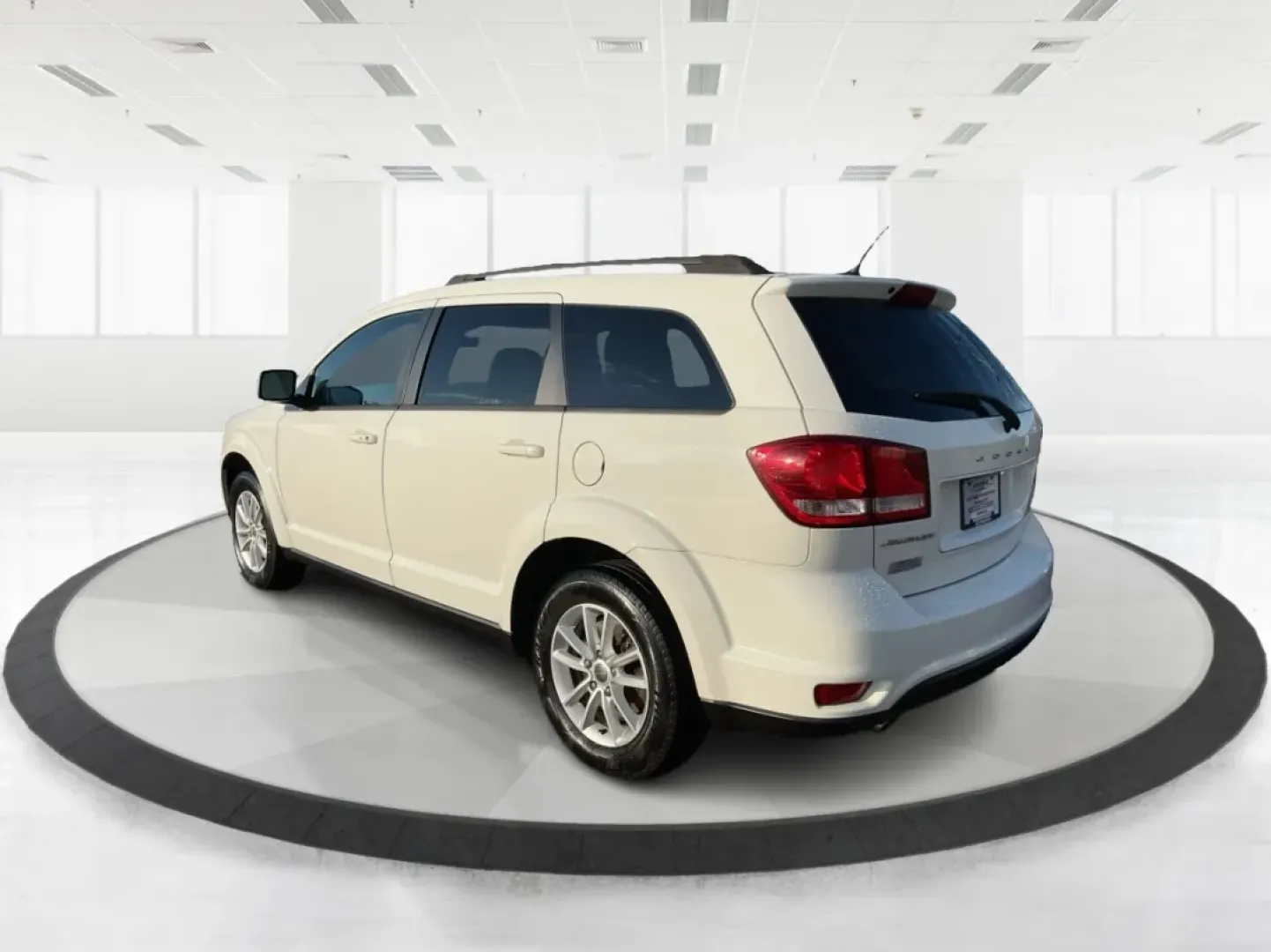 2014 Dodge Journey SXT (3C4PDCBG0ET) with an 3.6L V6 DOHC 24V engine, 6-Speed Automatic transmission, located at 8750 N County Rd 25A, Piqua, OH, 45356, (937) 908-9800, 40.164391, -84.232513 - Are you looking for the perfect blend of comfort, versatility, and reliability for your family adventures? Look no further than the 2014 Dodge Journey SXT, available now at Advantage Car and Credit in Troy, OH. This well-equipped SUV is ideal for growing families, weekend road trips, or anyone who n - Photo#4