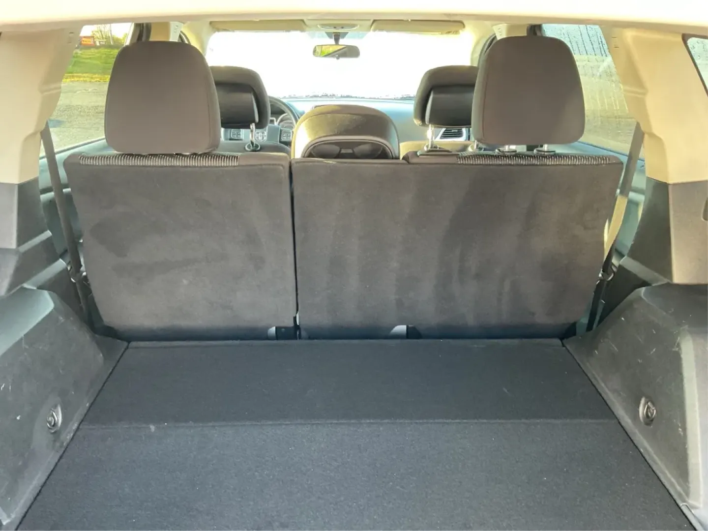 2014 Dodge Journey SXT (3C4PDCBG0ET) with an 3.6L V6 DOHC 24V engine, 6-Speed Automatic transmission, located at 8750 N County Rd 25A, Piqua, OH, 45356, (937) 908-9800, 40.164391, -84.232513 - Are you looking for the perfect blend of comfort, versatility, and reliability for your family adventures? Look no further than the 2014 Dodge Journey SXT, available now at Advantage Car and Credit in Troy, OH. This well-equipped SUV is ideal for growing families, weekend road trips, or anyone who n - Photo#12