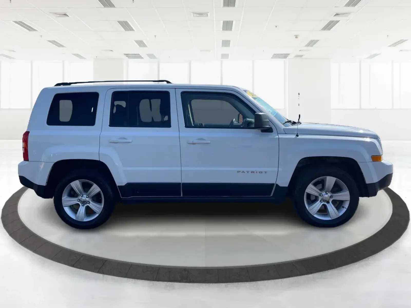 2014 Jeep Patriot Latitude (1C4NJPFB0ED) with an 2.4L I-4 DOHC engine, located at 1951 S Dayton Lakeview Rd., New Carlisle, OH, 45344, (937) 908-9800, 39.890999, -84.050255 - **Adventure Awaits with This 2014 Jeep Patriot Latitude! Perfect for Road Trips and Family Outings!**<br /> <br /> Explore the open road with confidence and comfort in this 2014 Jeep Patriot Latitude, now available at Advantage Car and Credit in Fairborn, OH. This SUV is the ideal companion for grow - Photo#1