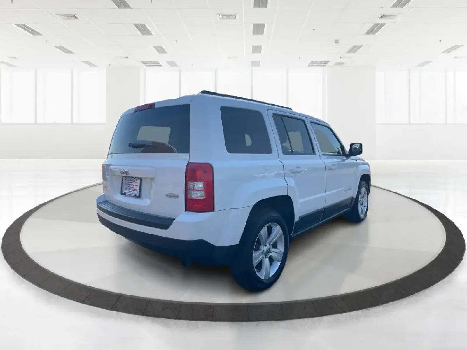 2014 Jeep Patriot Latitude (1C4NJPFB0ED) with an 2.4L I-4 DOHC engine, located at 1951 S Dayton Lakeview Rd., New Carlisle, OH, 45344, (937) 908-9800, 39.890999, -84.050255 - **Adventure Awaits with This 2014 Jeep Patriot Latitude! Perfect for Road Trips and Family Outings!**<br /> <br /> Explore the open road with confidence and comfort in this 2014 Jeep Patriot Latitude, now available at Advantage Car and Credit in Fairborn, OH. This SUV is the ideal companion for grow - Photo#2