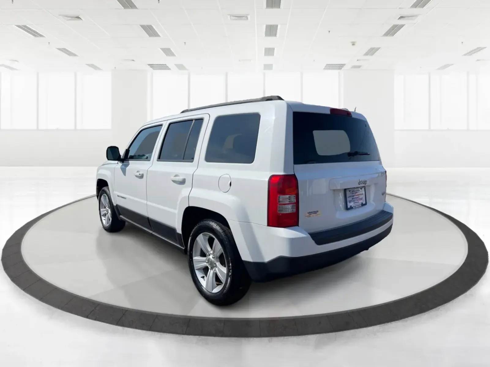2014 Jeep Patriot Latitude (1C4NJPFB0ED) with an 2.4L I-4 DOHC engine, located at 1951 S Dayton Lakeview Rd., New Carlisle, OH, 45344, (937) 908-9800, 39.890999, -84.050255 - **Adventure Awaits with This 2014 Jeep Patriot Latitude! Perfect for Road Trips and Family Outings!**<br /> <br /> Explore the open road with confidence and comfort in this 2014 Jeep Patriot Latitude, now available at Advantage Car and Credit in Fairborn, OH. This SUV is the ideal companion for grow - Photo#4