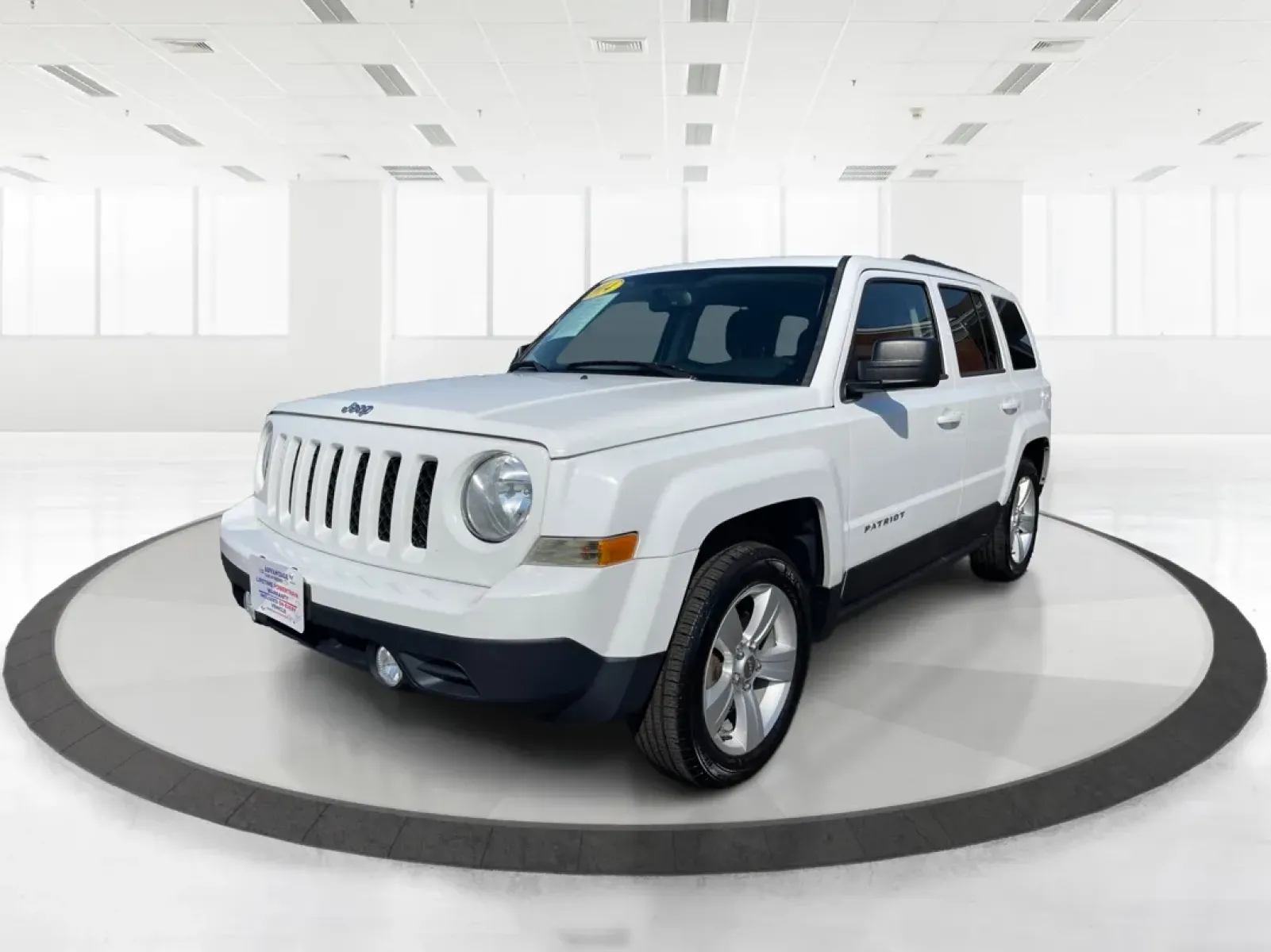 2014 Jeep Patriot Latitude (1C4NJPFB0ED) with an 2.4L I-4 DOHC engine, located at 1951 S Dayton Lakeview Rd., New Carlisle, OH, 45344, (937) 908-9800, 39.890999, -84.050255 - **Adventure Awaits with This 2014 Jeep Patriot Latitude! Perfect for Road Trips and Family Outings!**<br /> <br /> Explore the open road with confidence and comfort in this 2014 Jeep Patriot Latitude, now available at Advantage Car and Credit in Fairborn, OH. This SUV is the ideal companion for grow - Photo#8