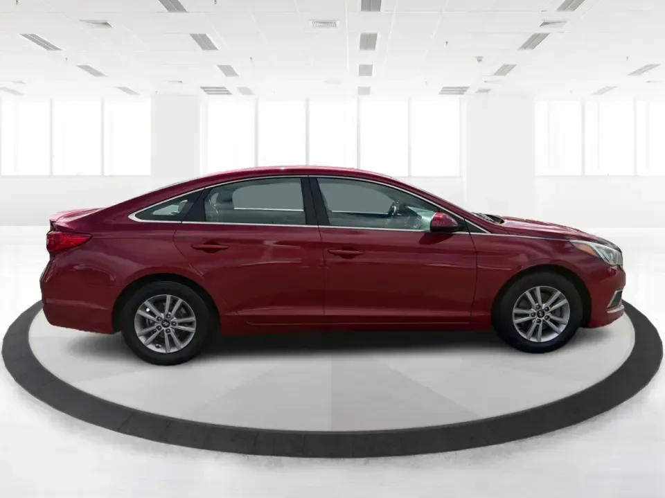 2017 Hyundai Sonata Base (5NPE24AF8HH) with an 2.4L L4 DOHC 16V engine, 7A transmission, located at 1099 N County Rd 25A , Troy, OH, 45373, (937) 908-9800, 40.057079, -84.212883 - Need a reliable, comfortable sedan for the daily drive from Troy to Dayton, school drop-offs, or quick weekend getaways to Charleston Falls Preserve? This red 2017 Hyundai Sonata Base is built for real life-easy to park downtown near the Miami County Courthouse, smooth on I75, and efficient enough f- Photo#1