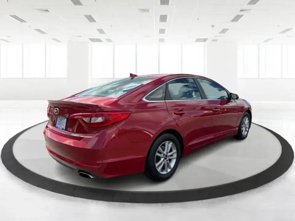 2017 Hyundai Sonata Base (5NPE24AF8HH) with an 2.4L L4 DOHC 16V engine, 7A transmission, located at 1099 N County Rd 25A , Troy, OH, 45373, (937) 908-9800, 40.057079, -84.212883 - Need a reliable, comfortable sedan for the daily drive from Troy to Dayton, school drop-offs, or quick weekend getaways to Charleston Falls Preserve? This red 2017 Hyundai Sonata Base is built for real life-easy to park downtown near the Miami County Courthouse, smooth on I75, and efficient enough f- Photo#2