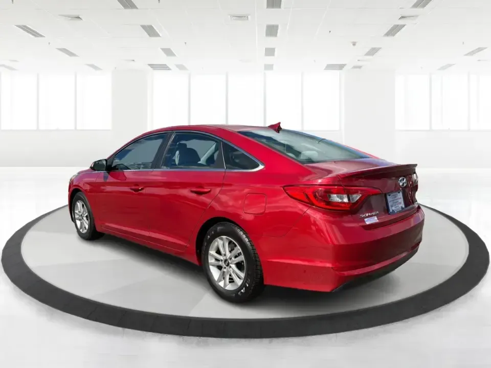 2017 Hyundai Sonata Base (5NPE24AF8HH) with an 2.4L L4 DOHC 16V engine, 7A transmission, located at 1099 N County Rd 25A , Troy, OH, 45373, (937) 908-9800, 40.057079, -84.212883 - Need a reliable, comfortable sedan for the daily drive from Troy to Dayton, school drop-offs, or quick weekend getaways to Charleston Falls Preserve? This red 2017 Hyundai Sonata Base is built for real life-easy to park downtown near the Miami County Courthouse, smooth on I75, and efficient enough f- Photo#4