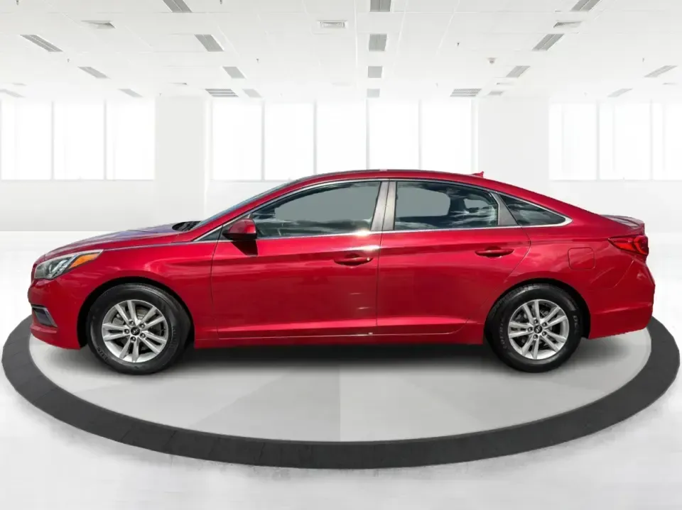 2017 Hyundai Sonata Base (5NPE24AF8HH) with an 2.4L L4 DOHC 16V engine, 7A transmission, located at 1099 N County Rd 25A , Troy, OH, 45373, (937) 908-9800, 40.057079, -84.212883 - Need a reliable, comfortable sedan for the daily drive from Troy to Dayton, school drop-offs, or quick weekend getaways to Charleston Falls Preserve? This red 2017 Hyundai Sonata Base is built for real life-easy to park downtown near the Miami County Courthouse, smooth on I75, and efficient enough f- Photo#5