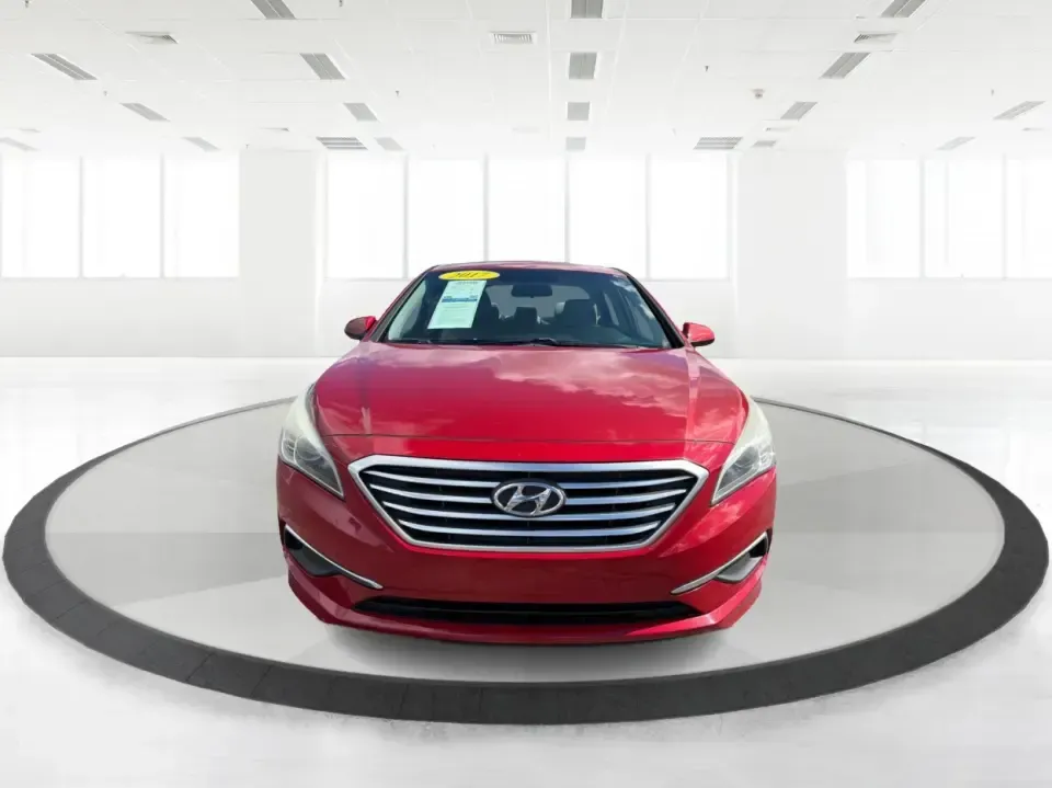 2017 Hyundai Sonata Base (5NPE24AF8HH) with an 2.4L L4 DOHC 16V engine, 7A transmission, located at 1099 N County Rd 25A , Troy, OH, 45373, (937) 908-9800, 40.057079, -84.212883 - Need a reliable, comfortable sedan for the daily drive from Troy to Dayton, school drop-offs, or quick weekend getaways to Charleston Falls Preserve? This red 2017 Hyundai Sonata Base is built for real life-easy to park downtown near the Miami County Courthouse, smooth on I75, and efficient enough f- Photo#7