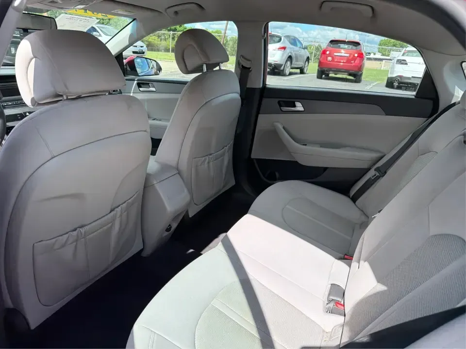 2017 Hyundai Sonata Base (5NPE24AF8HH) with an 2.4L L4 DOHC 16V engine, 7A transmission, located at 1099 N County Rd 25A , Troy, OH, 45373, (937) 908-9800, 40.057079, -84.212883 - Need a reliable, comfortable sedan for the daily drive from Troy to Dayton, school drop-offs, or quick weekend getaways to Charleston Falls Preserve? This red 2017 Hyundai Sonata Base is built for real life-easy to park downtown near the Miami County Courthouse, smooth on I75, and efficient enough f- Photo#10