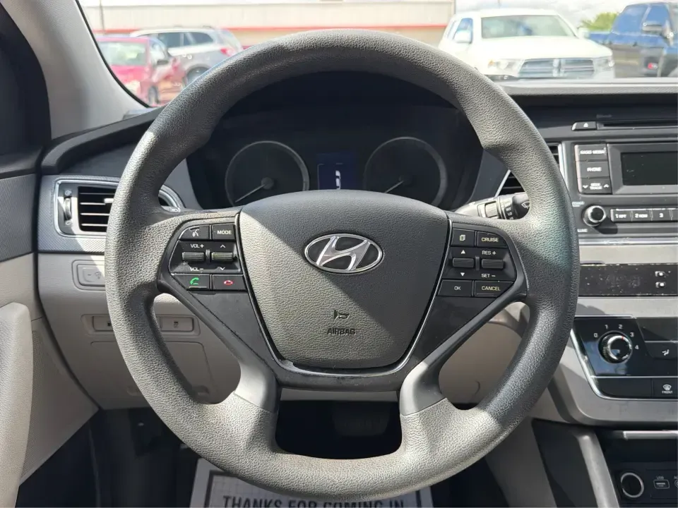 2017 Hyundai Sonata Base (5NPE24AF8HH) with an 2.4L L4 DOHC 16V engine, 7A transmission, located at 1099 N County Rd 25A , Troy, OH, 45373, (937) 908-9800, 40.057079, -84.212883 - Need a reliable, comfortable sedan for the daily drive from Troy to Dayton, school drop-offs, or quick weekend getaways to Charleston Falls Preserve? This red 2017 Hyundai Sonata Base is built for real life-easy to park downtown near the Miami County Courthouse, smooth on I75, and efficient enough f- Photo#16