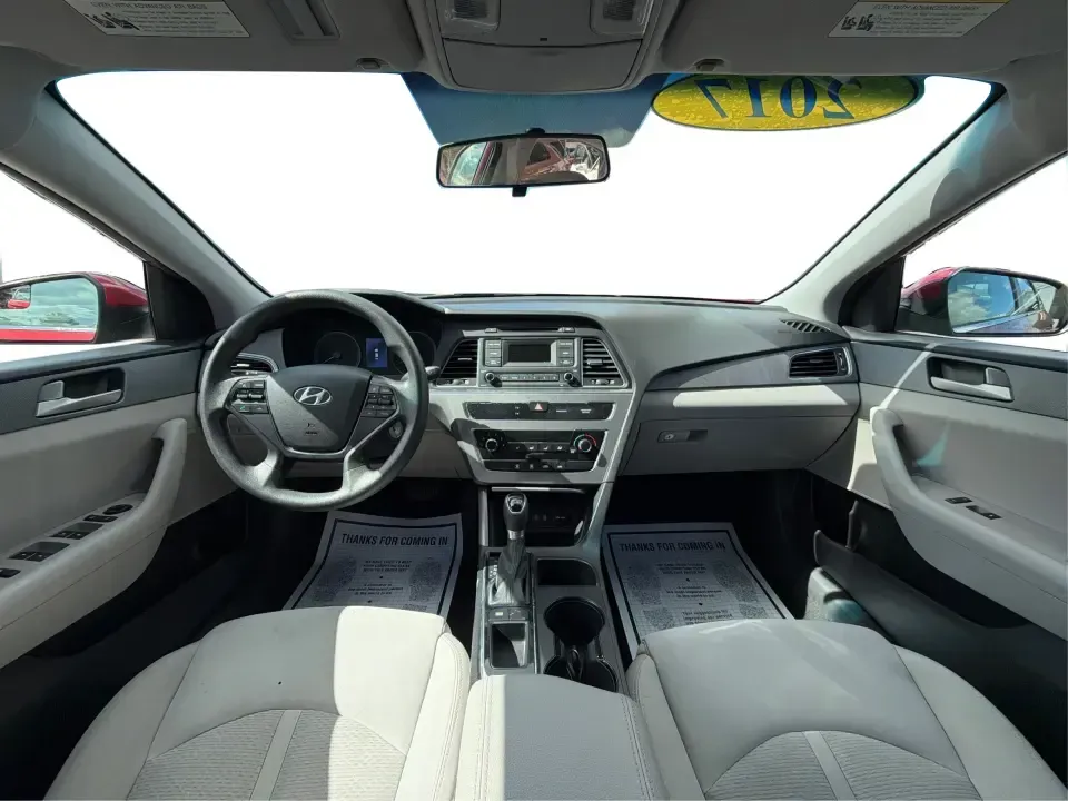 2017 Hyundai Sonata Base (5NPE24AF8HH) with an 2.4L L4 DOHC 16V engine, 7A transmission, located at 1099 N County Rd 25A , Troy, OH, 45373, (937) 908-9800, 40.057079, -84.212883 - Need a reliable, comfortable sedan for the daily drive from Troy to Dayton, school drop-offs, or quick weekend getaways to Charleston Falls Preserve? This red 2017 Hyundai Sonata Base is built for real life-easy to park downtown near the Miami County Courthouse, smooth on I75, and efficient enough f- Photo#20