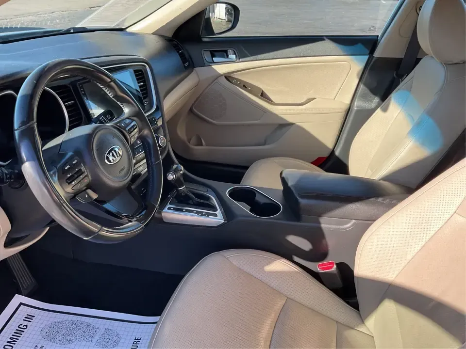 2015 Kia Optima EX (5XXGN4A74FG) with an Theta II 2.4L I-4 gasoline direct injection engine, 6-Speed Automatic transmission, located at 1099 N County Rd 25A , Troy, OH, 45373, (937) 908-9800, 40.057079, -84.212883 - Experience the perfect blend of style, comfort, and reliability with this 2015 Kia Optima EX at Advantage Car and Credit in Xenia, OH. Whether you're embarking on daily commutes, family road trips, or simply looking for a trusty companion for your adventures, this vehicle is designed to meet your di - Photo#9