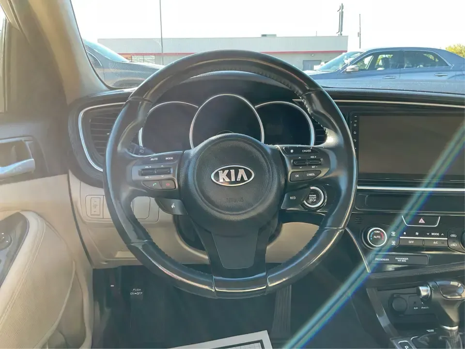 2015 Kia Optima EX (5XXGN4A74FG) with an Theta II 2.4L I-4 gasoline direct injection engine, 6-Speed Automatic transmission, located at 1099 N County Rd 25A , Troy, OH, 45373, (937) 908-9800, 40.057079, -84.212883 - Experience the perfect blend of style, comfort, and reliability with this 2015 Kia Optima EX at Advantage Car and Credit in Xenia, OH. Whether you're embarking on daily commutes, family road trips, or simply looking for a trusty companion for your adventures, this vehicle is designed to meet your di - Photo#16