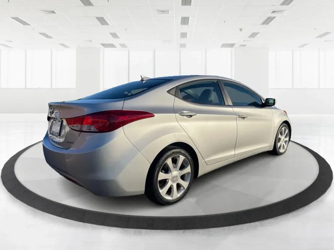 2013 Hyundai Elantra Limited (5NPDH4AE8DH) with an 1.8L I-4 DOHC engine, located at 1099 N County Rd 25A , Troy, OH, 45373, (937) 908-9800, 40.057079, -84.212883 - Elevate your daily commute and family adventures with the versatile and stylish 2013 Hyundai Elantra Limited, available now at Advantage Car and Credit - Troy. This exceptional sedan is designed for those who appreciate a blend of comfort, efficiency, and advanced technology, making it an ideal choi - Photo#2