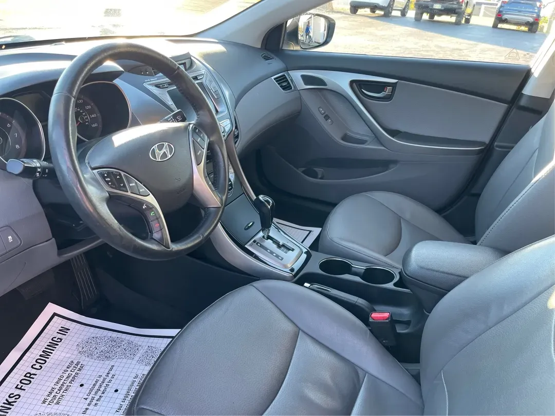 2013 Hyundai Elantra Limited (5NPDH4AE8DH) with an 1.8L I-4 DOHC engine, located at 1099 N County Rd 25A , Troy, OH, 45373, (937) 908-9800, 40.057079, -84.212883 - Elevate your daily commute and family adventures with the versatile and stylish 2013 Hyundai Elantra Limited, available now at Advantage Car and Credit - Troy. This exceptional sedan is designed for those who appreciate a blend of comfort, efficiency, and advanced technology, making it an ideal choi - Photo#9