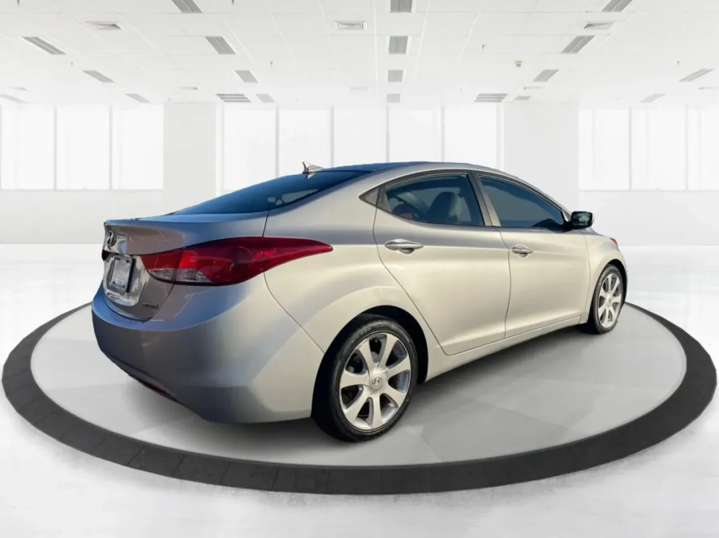 2013 Hyundai Elantra Limited (5NPDH4AE8DH) with an 1.8L I-4 DOHC engine, located at 8750 N County Rd 25A, Piqua, OH, 45356, (937) 908-9800, 40.164391, -84.232513 - Elevate your daily commute and family adventures with the versatile and stylish 2013 Hyundai Elantra Limited, available now at Advantage Car and Credit - Troy. This exceptional sedan is designed for those who appreciate a blend of comfort, efficiency, and advanced technology, making it an ideal choi - Photo#2