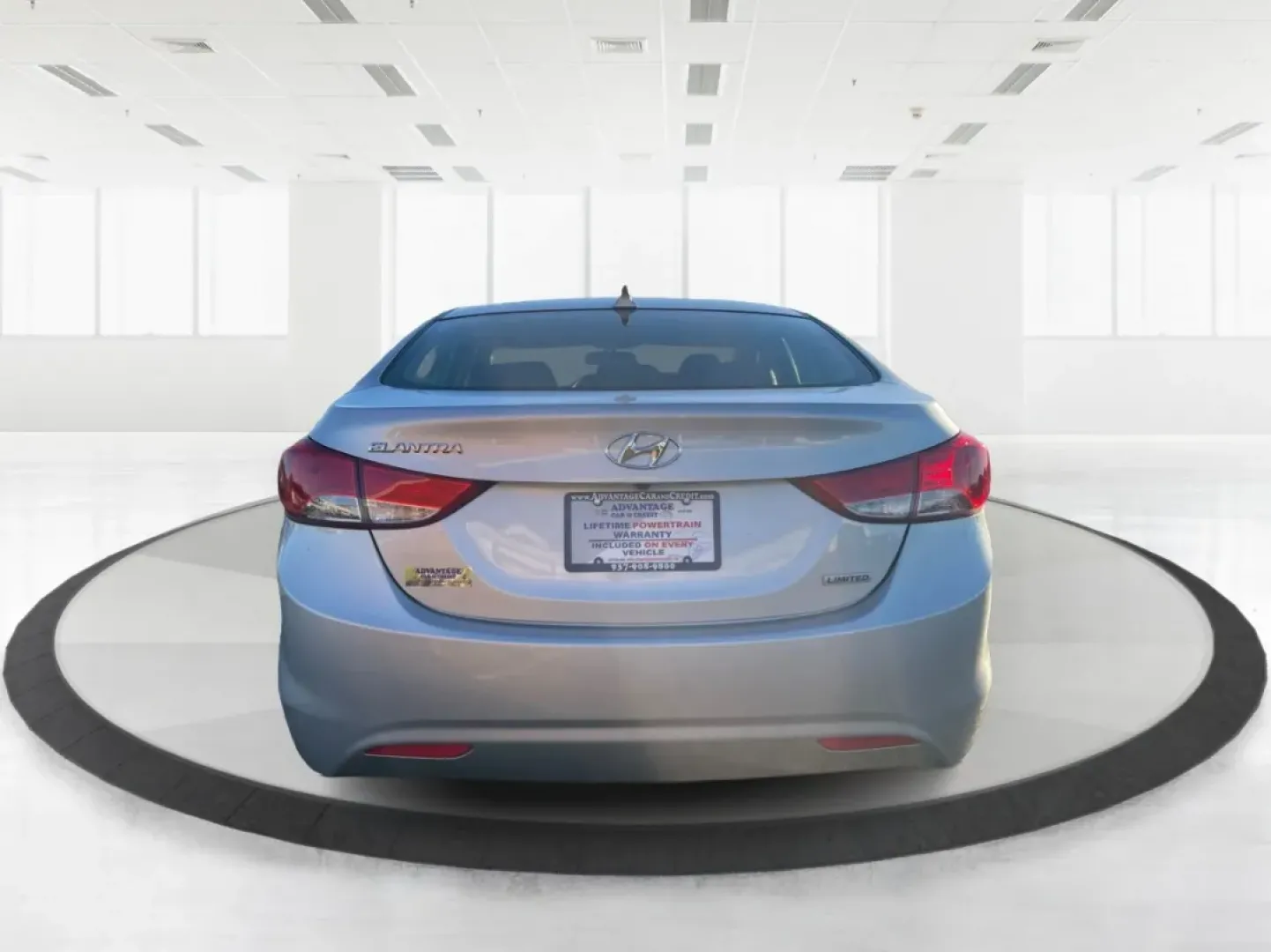 2013 Hyundai Elantra Limited (5NPDH4AE8DH) with an 1.8L I-4 DOHC engine, located at 8750 N County Rd 25A, Piqua, OH, 45356, (937) 908-9800, 40.164391, -84.232513 - Elevate your daily commute and family adventures with the versatile and stylish 2013 Hyundai Elantra Limited, available now at Advantage Car and Credit - Troy. This exceptional sedan is designed for those who appreciate a blend of comfort, efficiency, and advanced technology, making it an ideal choi - Photo#3