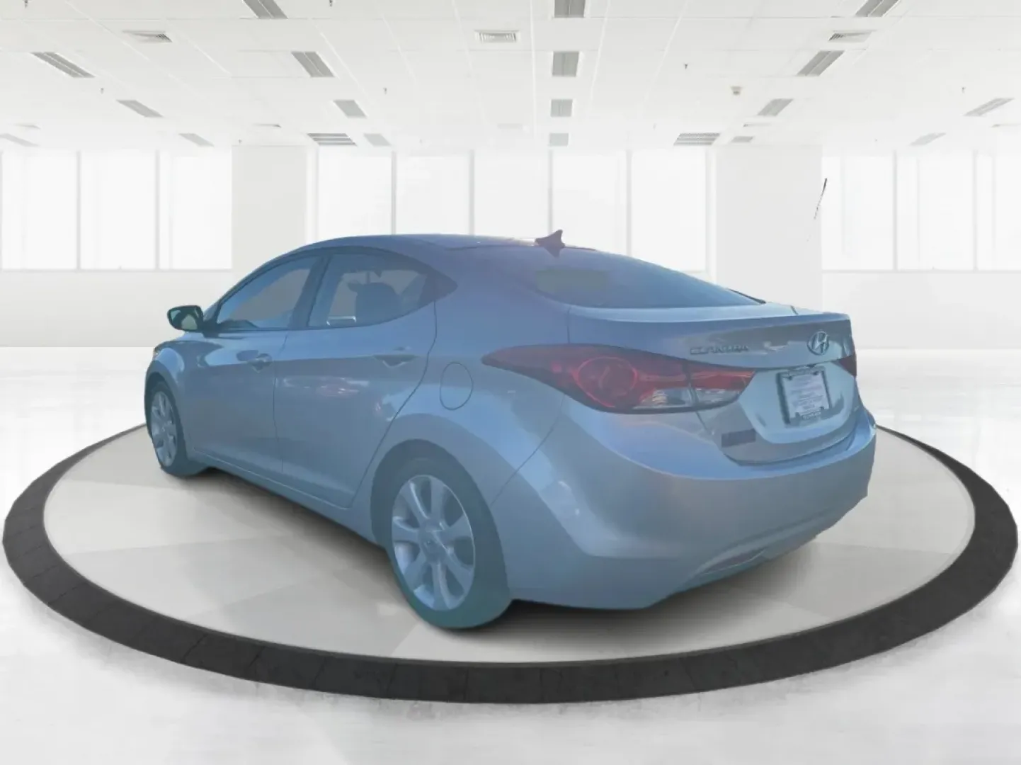 2013 Hyundai Elantra Limited (5NPDH4AE8DH) with an 1.8L I-4 DOHC engine, located at 8750 N County Rd 25A, Piqua, OH, 45356, (937) 908-9800, 40.164391, -84.232513 - Elevate your daily commute and family adventures with the versatile and stylish 2013 Hyundai Elantra Limited, available now at Advantage Car and Credit - Troy. This exceptional sedan is designed for those who appreciate a blend of comfort, efficiency, and advanced technology, making it an ideal choi - Photo#4