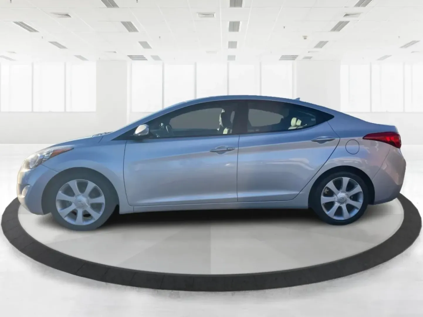 2013 Hyundai Elantra Limited (5NPDH4AE8DH) with an 1.8L I-4 DOHC engine, located at 8750 N County Rd 25A, Piqua, OH, 45356, (937) 908-9800, 40.164391, -84.232513 - Elevate your daily commute and family adventures with the versatile and stylish 2013 Hyundai Elantra Limited, available now at Advantage Car and Credit - Troy. This exceptional sedan is designed for those who appreciate a blend of comfort, efficiency, and advanced technology, making it an ideal choi - Photo#5
