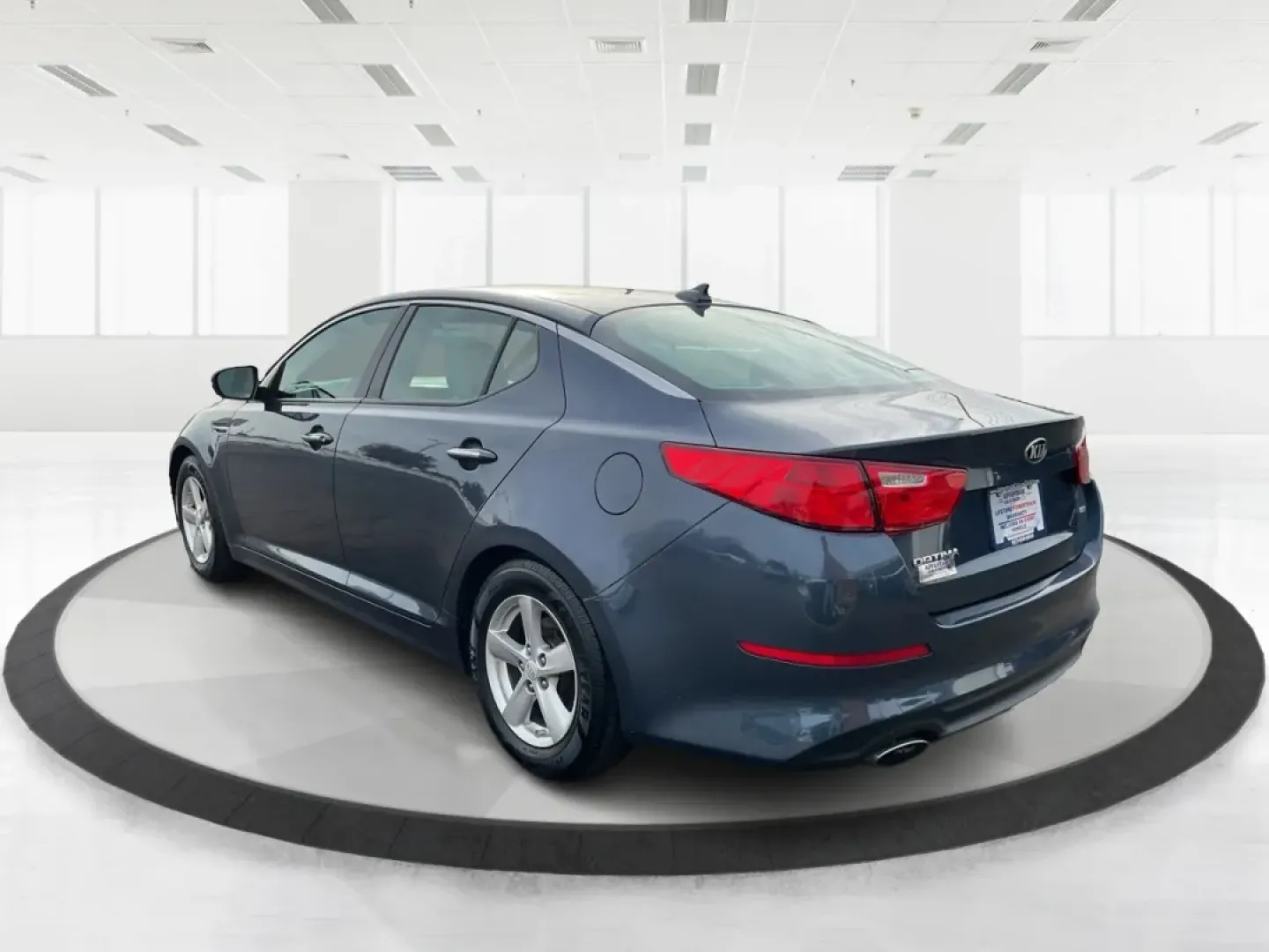 2015 Kia Optima LX (5XXGM4A77FG) with an Theta II 2.4L I-4 gasoline direct injection engine, located at 8750 N County Rd 25A, Piqua, OH, 45356, (937) 908-9800, 40.164391, -84.232513 - 2015 Kia Optima LX - Photo#4