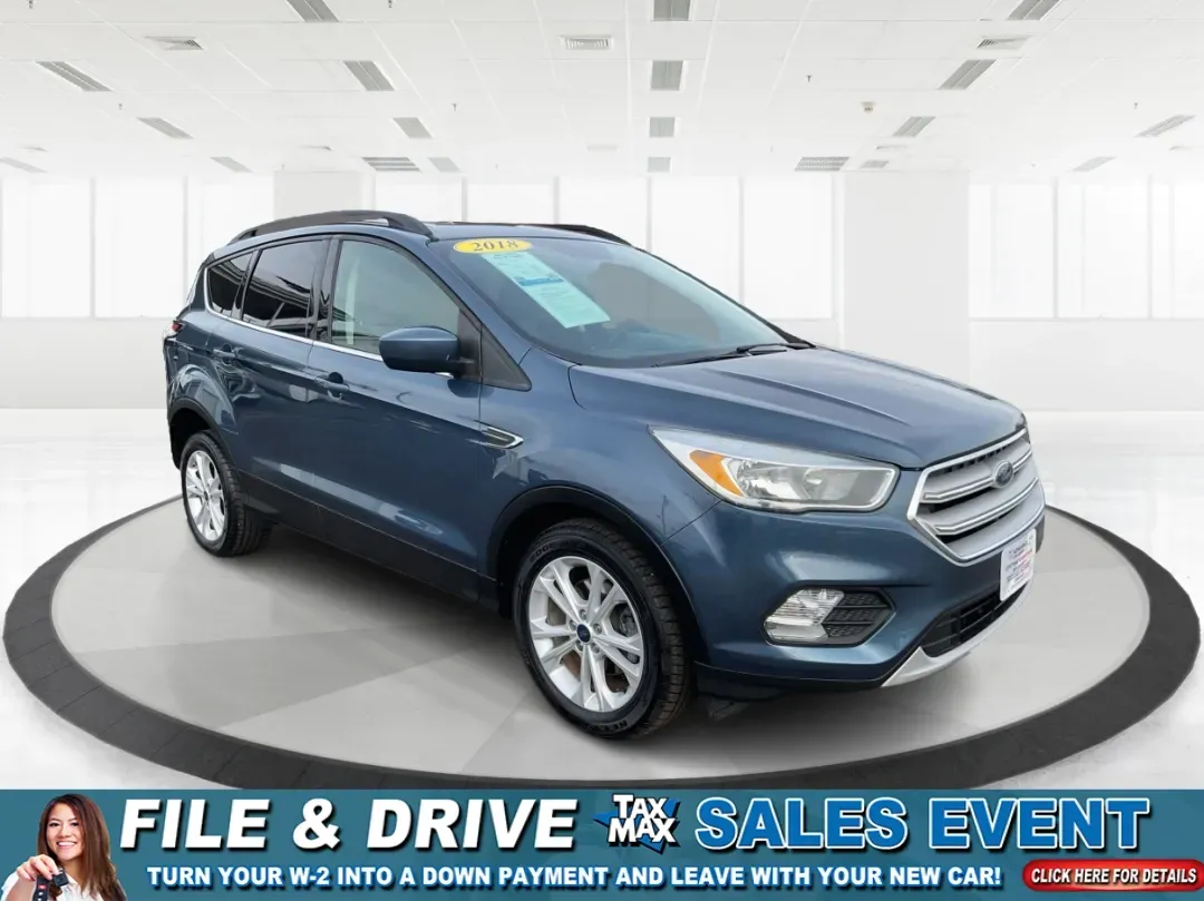 2018 Ford Escape SE (1FMCU0GD7JU) with an 1.5L L4 DOHC 16V engine, 6A transmission, located at 8750 N County Rd 25A, Piqua, OH, 45356, (937) 908-9800, 40.164391, -84.232513 - **Discover Your Next Adventure with the 2018 Ford Escape SE at Advantage Car and Credit - Piqua!**<br /> <br /> Are you ready to elevate your daily commute or weekend getaways? The 2018 Ford Escape SE is the perfect vehicle for those who crave both style and functionality in their daily lives. Wheth - Photo#0