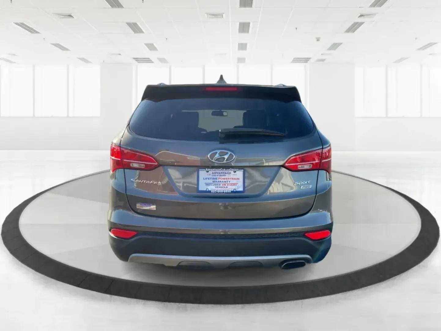 2014 Hyundai Santa Fe 2.4L (5XYZUDLBXEG) with an Theta II 2.4L I-4 gasoline direct injection engine, located at 8750 N County Rd 25A, Piqua, OH, 45356, (937) 908-9800, 40.164391, -84.232513 - **Explore New Adventures in the 2014 Hyundai Santa Fe from Advantage Car and Credit - Piqua!**<br /> <br /> Are you ready to elevate your family outings or weekend adventures? Look no further than this stunning 2014 Hyundai Santa Fe, perfect for those who crave both comfort and versatility in their - Photo#3