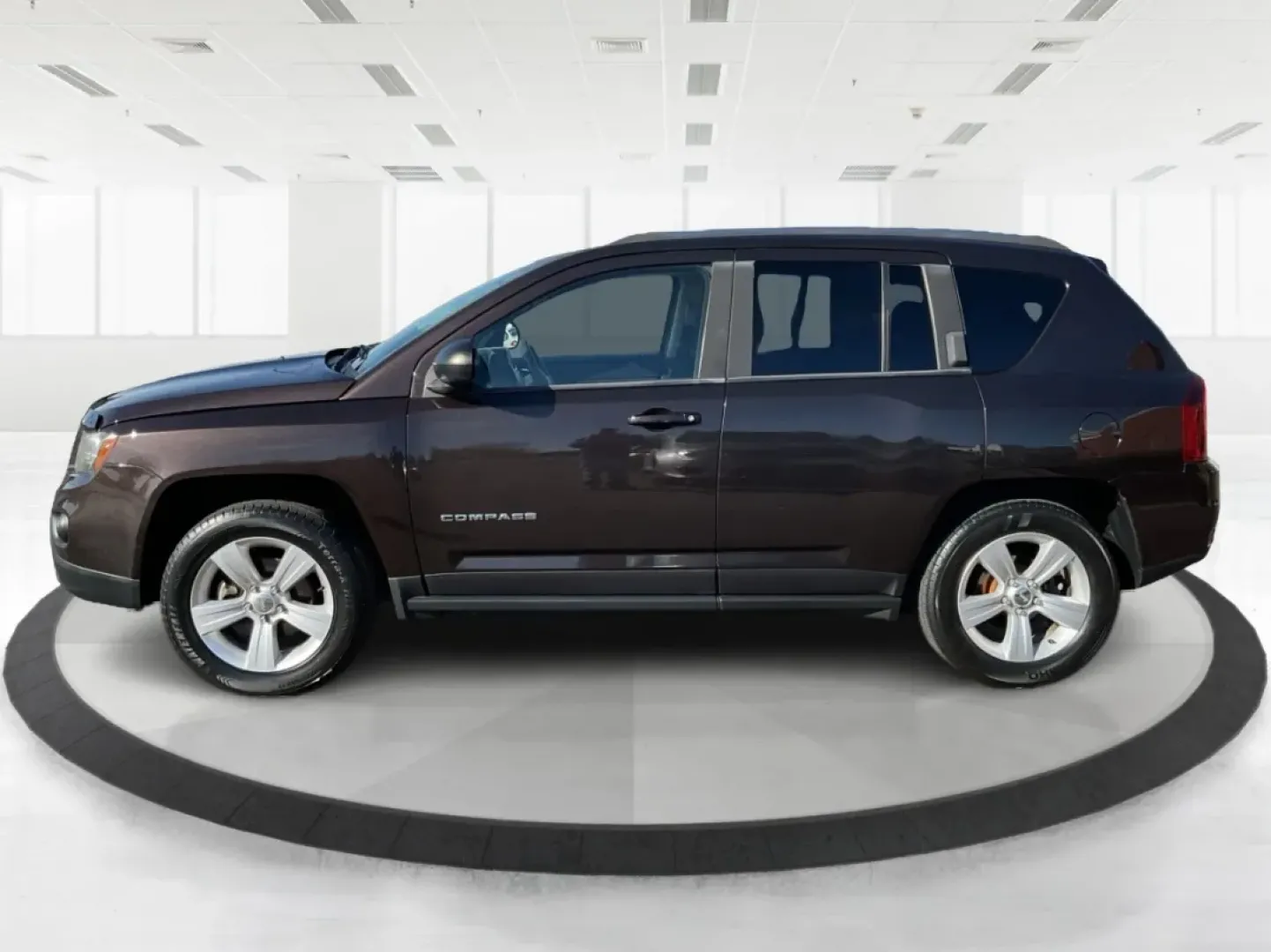 2014 Jeep Compass Sport (1C4NJDBB8ED) with an 2.4L I-4 DOHC engine, located at 1099 N County Rd 25A , Troy, OH, 45373, (937) 908-9800, 40.057079, -84.212883 - Discover the adventure-ready 2014 Jeep Compass, an SUV that's perfect for weekend getaways and daily commutes alike. Whether you're navigating the bustling streets of Troy or heading out on a family road trip to nearby attractions like the Miami County Fair, this rugged vehicle will elevate your dri - Photo#5