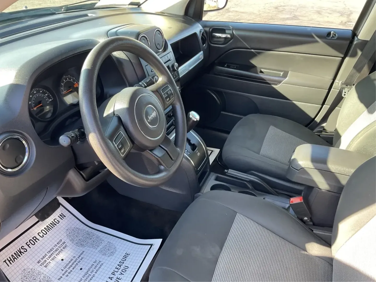 2014 Jeep Compass Sport (1C4NJDBB8ED) with an 2.4L I-4 DOHC engine, located at 1099 N County Rd 25A , Troy, OH, 45373, (937) 908-9800, 40.057079, -84.212883 - Discover the adventure-ready 2014 Jeep Compass, an SUV that's perfect for weekend getaways and daily commutes alike. Whether you're navigating the bustling streets of Troy or heading out on a family road trip to nearby attractions like the Miami County Fair, this rugged vehicle will elevate your dri - Photo#9