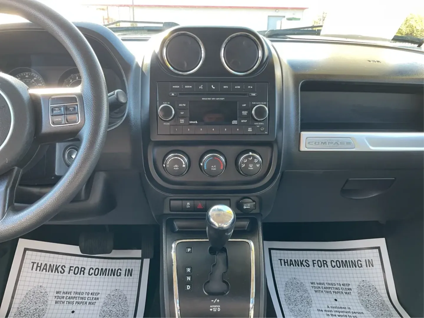 2014 Jeep Compass Sport (1C4NJDBB8ED) with an 2.4L I-4 DOHC engine, located at 1099 N County Rd 25A , Troy, OH, 45373, (937) 908-9800, 40.057079, -84.212883 - Discover the adventure-ready 2014 Jeep Compass, an SUV that's perfect for weekend getaways and daily commutes alike. Whether you're navigating the bustling streets of Troy or heading out on a family road trip to nearby attractions like the Miami County Fair, this rugged vehicle will elevate your dri - Photo#13