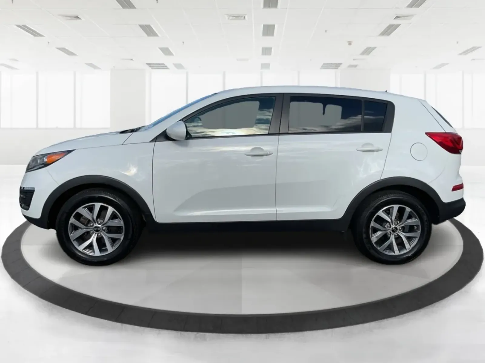 2015 Kia Sportage LX (KNDPB3AC1F7) with an Other engine, located at 1951 S Dayton Lakeview Rd., New Carlisle, OH, 45344, (937) 908-9800, 39.890999, -84.050255 - Are you looking for a versatile vehicle that can handle your family's daily adventures while also being budget-friendly? Look no further than this 2015 Kia Sportage LX, now available at Advantage Car and Credit in Fairborn, OH. This stylish crossover SUV is perfect for growing families, weekend geta - Photo#4