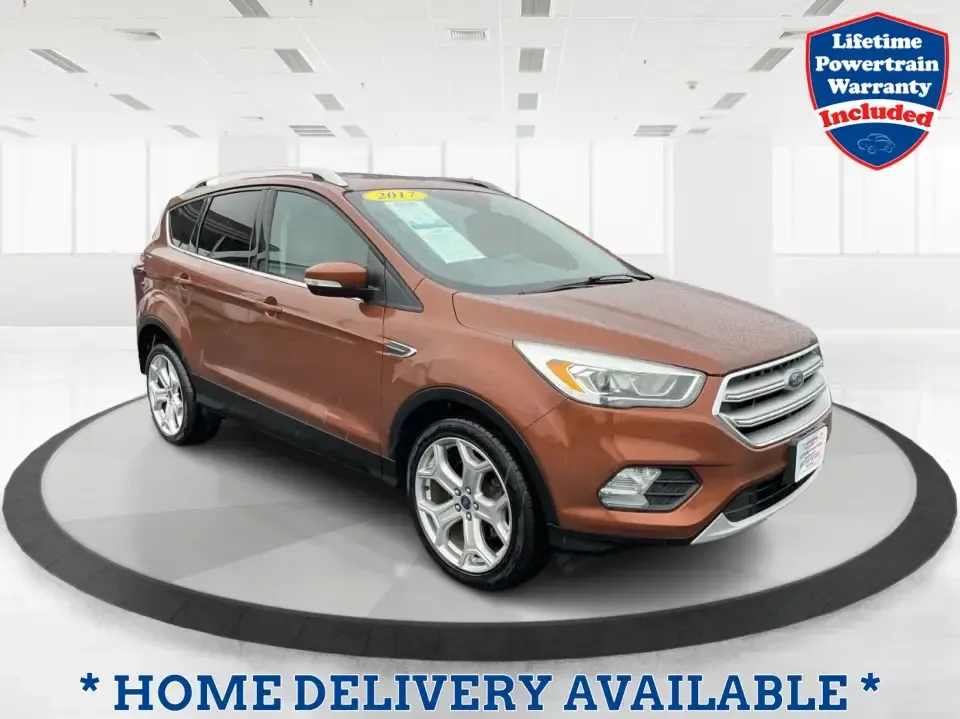 2017 Ford Escape Titanium 4WD (1FMCU9J94HU) with an 2.0L L4 DOHC 16V engine, 6A transmission, located at 8750 N County Rd 25A, Piqua, OH, 45356, (937) 908-9800, 40.164391, -84.232513 - Load up the family, point the hood toward Indian Lake for a weekend escape, or make your daily commute down I75 feel a lot more comfortable-this 2017 Ford Escape Titanium 4WD is the kind of compact SUV that fits real life in Piqua, OH. With confident four-wheel drive for unpredictable Midwest weathe- Photo#0