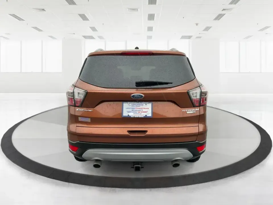 2017 Ford Escape Titanium 4WD (1FMCU9J94HU) with an 2.0L L4 DOHC 16V engine, 6A transmission, located at 8750 N County Rd 25A, Piqua, OH, 45356, (937) 908-9800, 40.164391, -84.232513 - Load up the family, point the hood toward Indian Lake for a weekend escape, or make your daily commute down I75 feel a lot more comfortable-this 2017 Ford Escape Titanium 4WD is the kind of compact SUV that fits real life in Piqua, OH. With confident four-wheel drive for unpredictable Midwest weathe- Photo#3