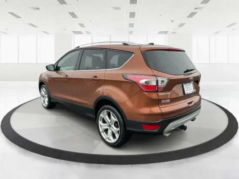 2017 Ford Escape Titanium 4WD (1FMCU9J94HU) with an 2.0L L4 DOHC 16V engine, 6A transmission, located at 8750 N County Rd 25A, Piqua, OH, 45356, (937) 908-9800, 40.164391, -84.232513 - Load up the family, point the hood toward Indian Lake for a weekend escape, or make your daily commute down I75 feel a lot more comfortable-this 2017 Ford Escape Titanium 4WD is the kind of compact SUV that fits real life in Piqua, OH. With confident four-wheel drive for unpredictable Midwest weathe- Photo#4