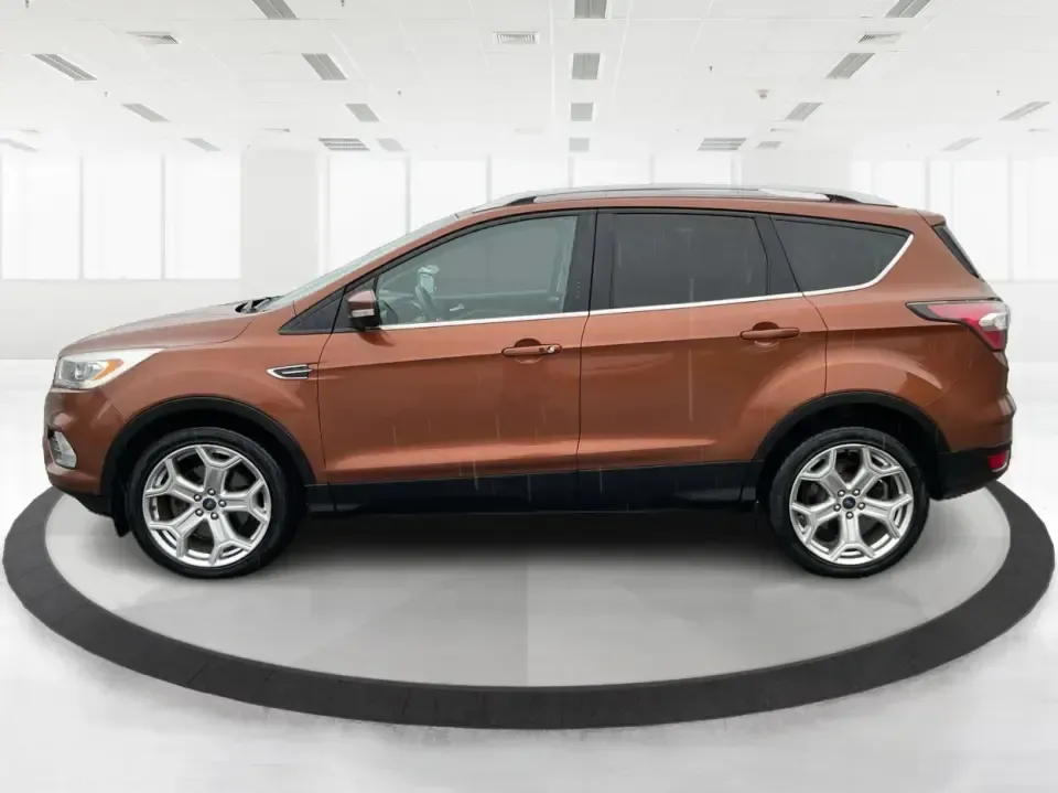 2017 Ford Escape Titanium 4WD (1FMCU9J94HU) with an 2.0L L4 DOHC 16V engine, 6A transmission, located at 8750 N County Rd 25A, Piqua, OH, 45356, (937) 908-9800, 40.164391, -84.232513 - Load up the family, point the hood toward Indian Lake for a weekend escape, or make your daily commute down I75 feel a lot more comfortable-this 2017 Ford Escape Titanium 4WD is the kind of compact SUV that fits real life in Piqua, OH. With confident four-wheel drive for unpredictable Midwest weathe- Photo#5