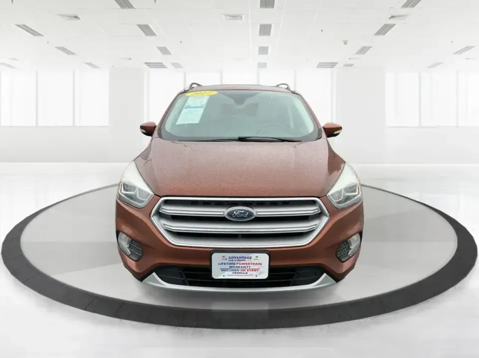 2017 Ford Escape Titanium 4WD (1FMCU9J94HU) with an 2.0L L4 DOHC 16V engine, 6A transmission, located at 8750 N County Rd 25A, Piqua, OH, 45356, (937) 908-9800, 40.164391, -84.232513 - Load up the family, point the hood toward Indian Lake for a weekend escape, or make your daily commute down I75 feel a lot more comfortable-this 2017 Ford Escape Titanium 4WD is the kind of compact SUV that fits real life in Piqua, OH. With confident four-wheel drive for unpredictable Midwest weathe- Photo#7
