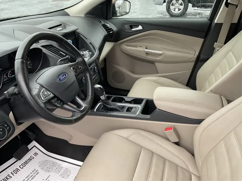 2017 Ford Escape Titanium 4WD (1FMCU9J94HU) with an 2.0L L4 DOHC 16V engine, 6A transmission, located at 8750 N County Rd 25A, Piqua, OH, 45356, (937) 908-9800, 40.164391, -84.232513 - Load up the family, point the hood toward Indian Lake for a weekend escape, or make your daily commute down I75 feel a lot more comfortable-this 2017 Ford Escape Titanium 4WD is the kind of compact SUV that fits real life in Piqua, OH. With confident four-wheel drive for unpredictable Midwest weathe- Photo#9