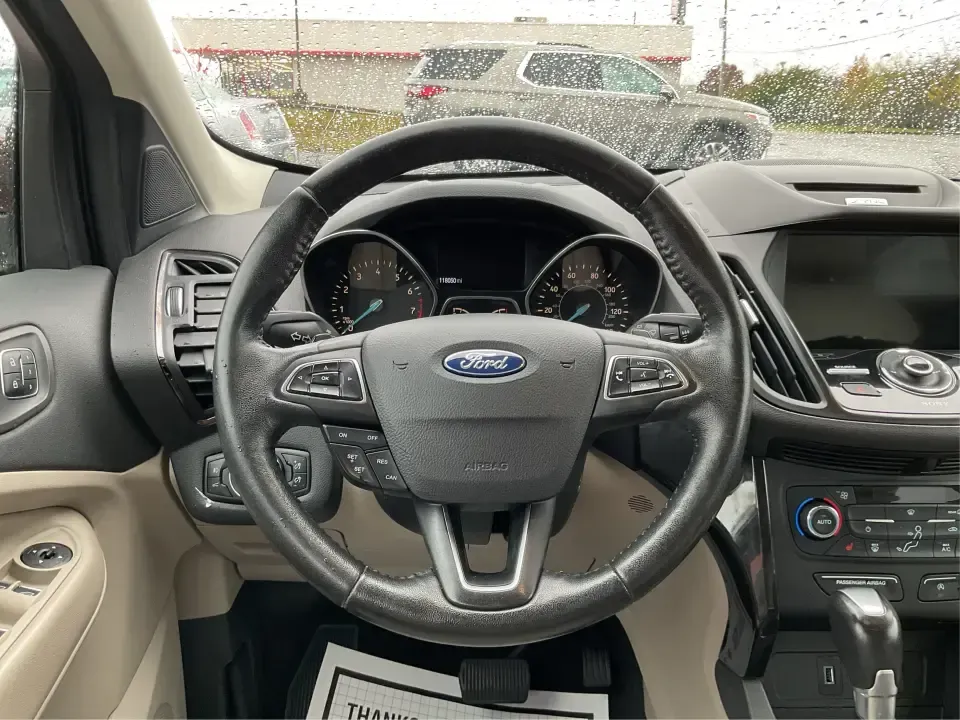 2017 Ford Escape Titanium 4WD (1FMCU9J94HU) with an 2.0L L4 DOHC 16V engine, 6A transmission, located at 8750 N County Rd 25A, Piqua, OH, 45356, (937) 908-9800, 40.164391, -84.232513 - Load up the family, point the hood toward Indian Lake for a weekend escape, or make your daily commute down I75 feel a lot more comfortable-this 2017 Ford Escape Titanium 4WD is the kind of compact SUV that fits real life in Piqua, OH. With confident four-wheel drive for unpredictable Midwest weathe- Photo#16